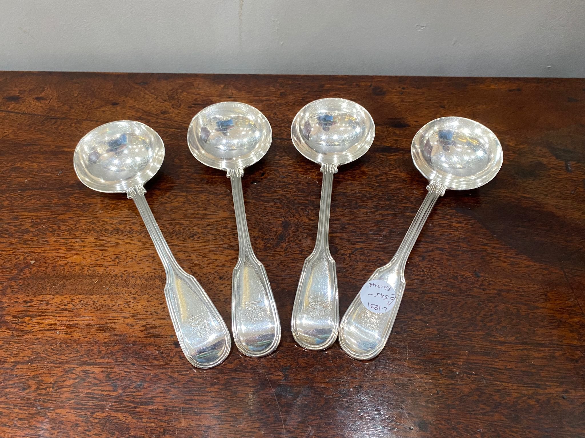 ⁠Four matching silver fiddle and double thread sauce ladles by William Chawner of London 1831 (BN1046)