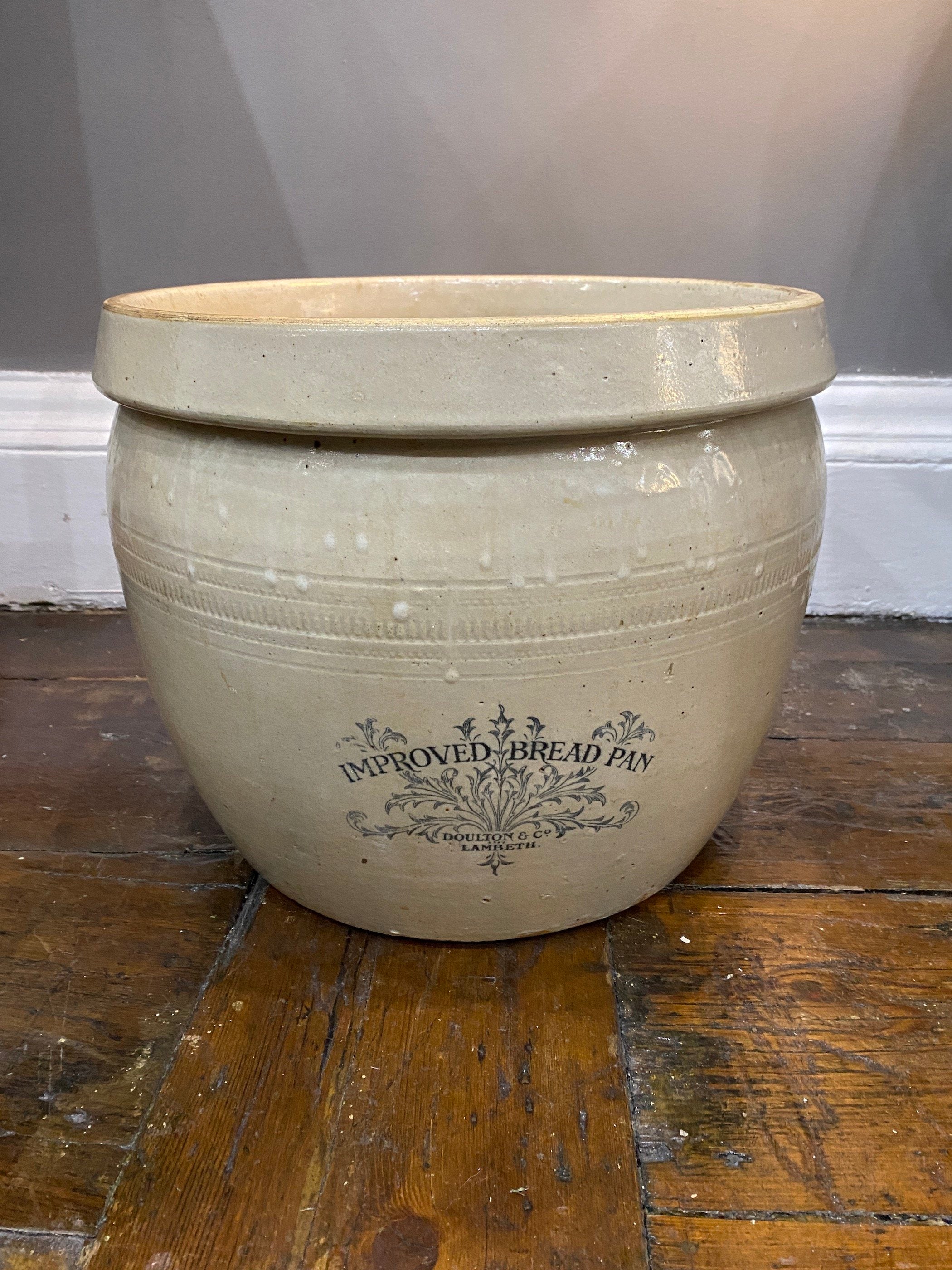 DOULTON IMPROVED BREAD PAN IN A DRAB GLAZE. CIRCA 1880