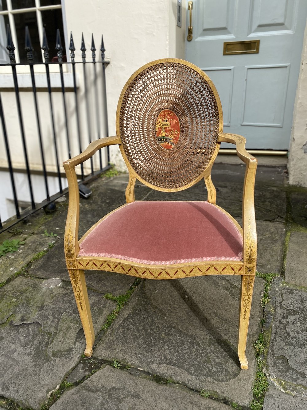 EARLY 20TH CENTURY ARMCHAIR WITH OVAL CANED BACK WITH A LACQUERED CHINOISERIE PAINTED PANEL CIRCA 1910