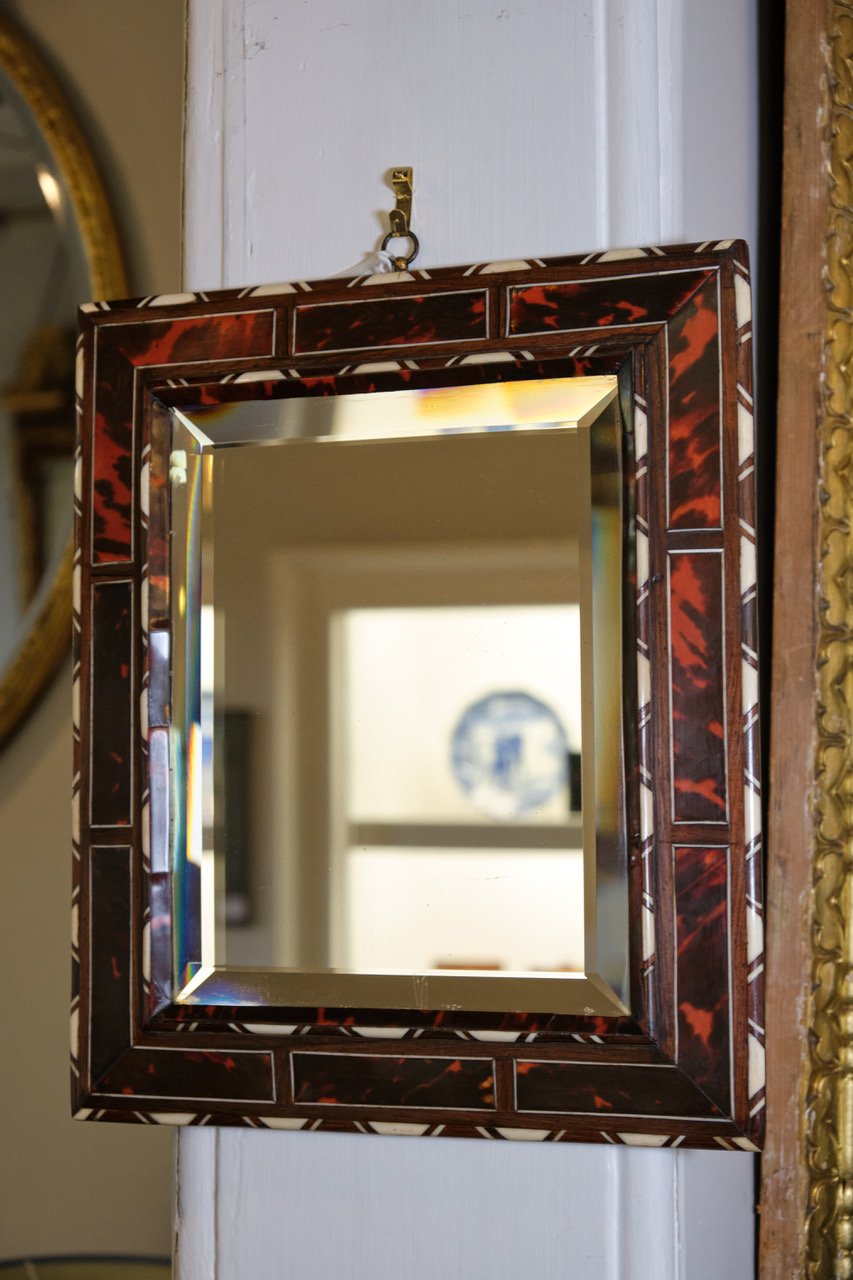 EARLY 20TH CENTURY TURKISH TORTOISE SHELL MIRROR WITH EBONY AND BONE INLAY ON ORIGINAL BEVELLED PLATE