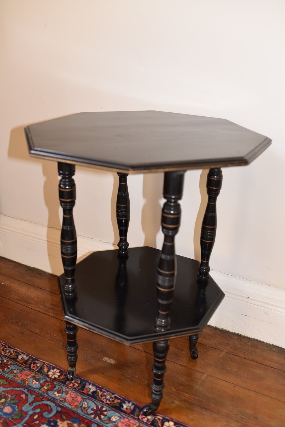 EBONISED ARTS AND CRAFTS TABLE ON TURNED COLUMNS AND LEG CIRCA 1890