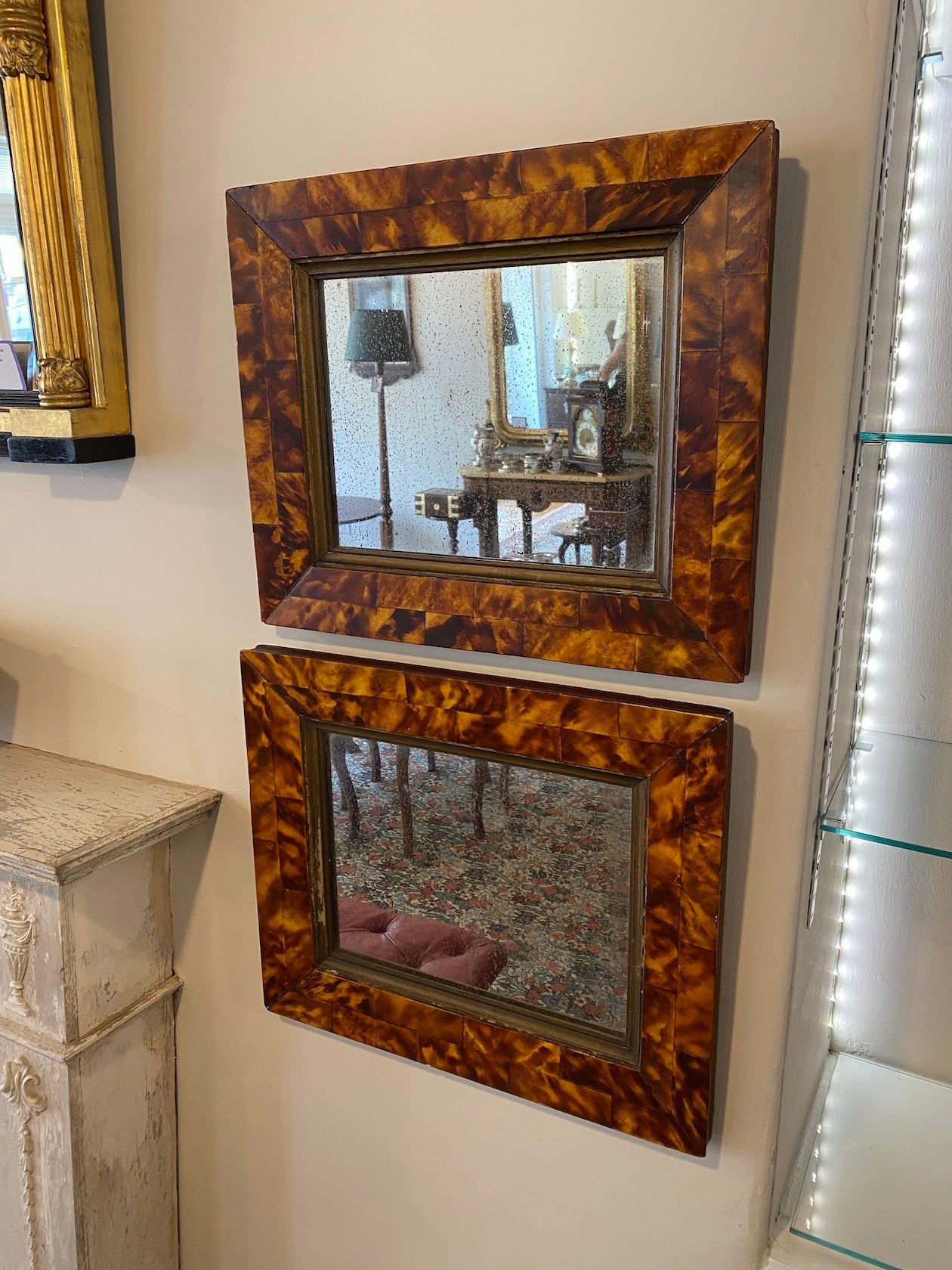 A PAIR OF 19TH CENTURY FAUX TORTOISESHELL MIRRORS