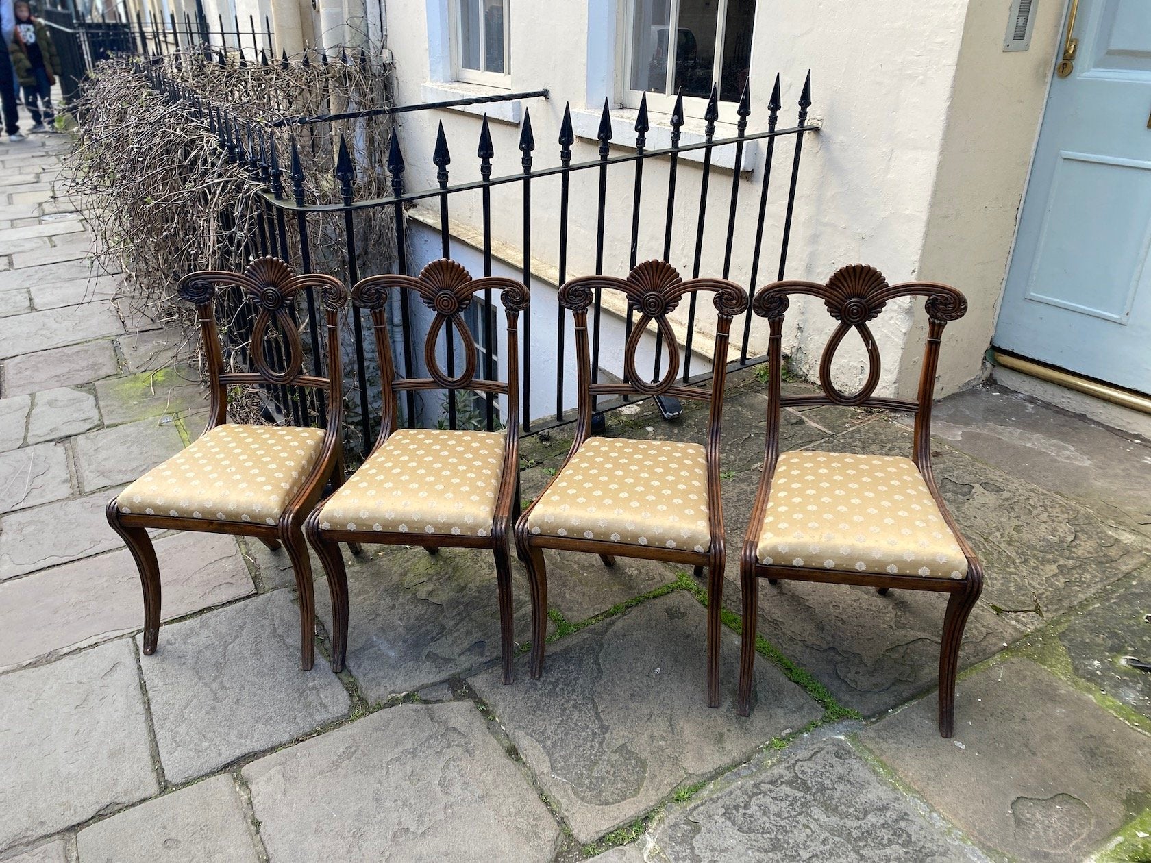 A SET OF FOUR REGENCY CHAIRS MADE OF BEECHWOOD TIMBER WITH DROP IN, UPHOLSTERED SEATS. ENGLISH CIRCA 1815