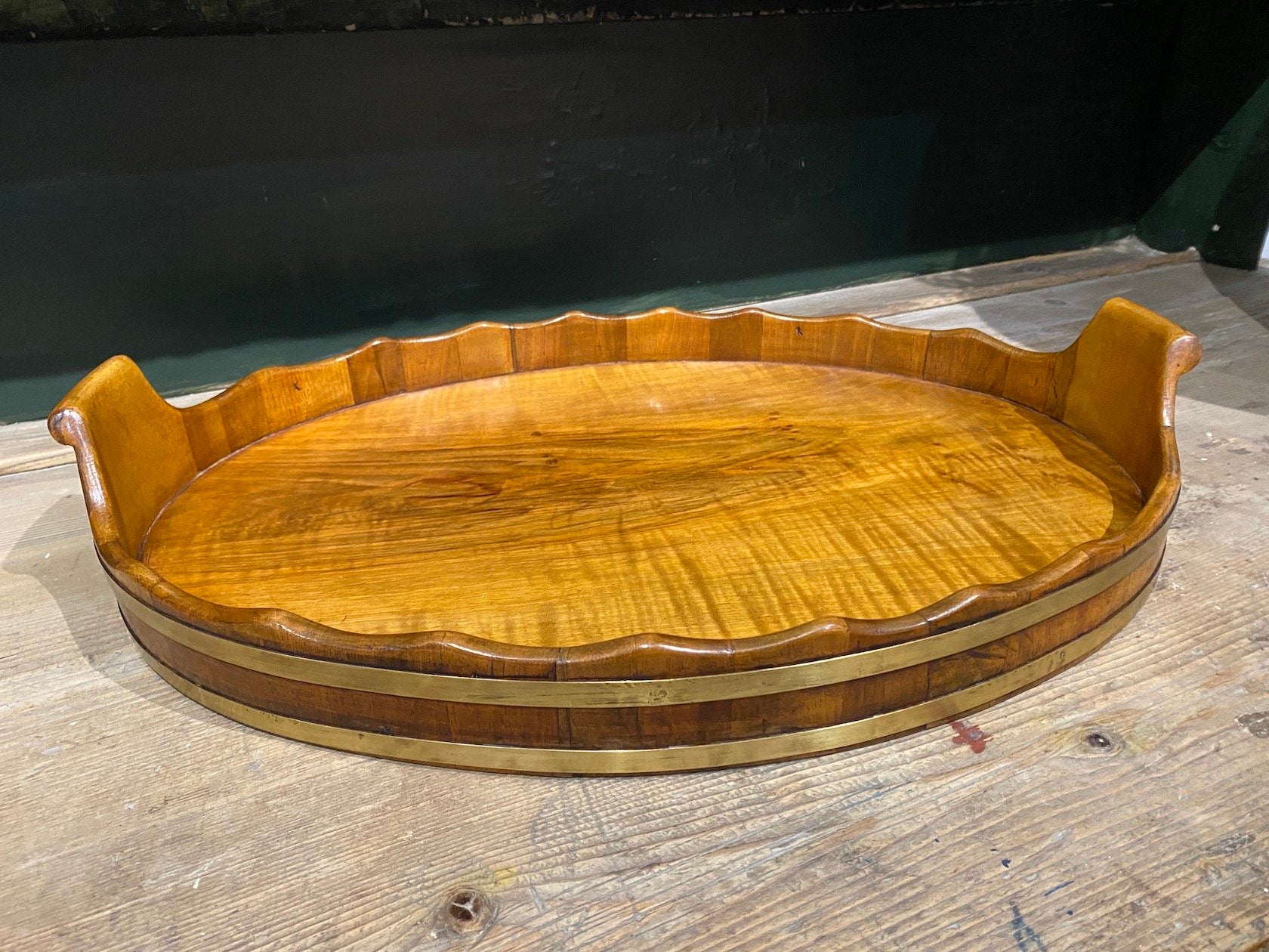 ANTIQUE WALNUT BRASS BOUND OVAL TRAY WITH WAVY RIM AND SCROLL HANDLES CIRCA 1880