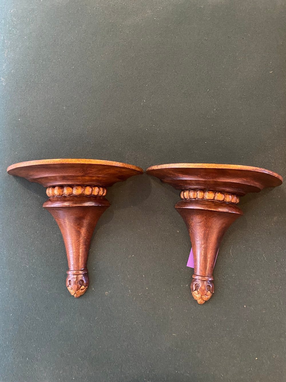 PAIR OF ANTIQUE MAHOGANY WALL BRACKETS WITH GILDED DETAILS