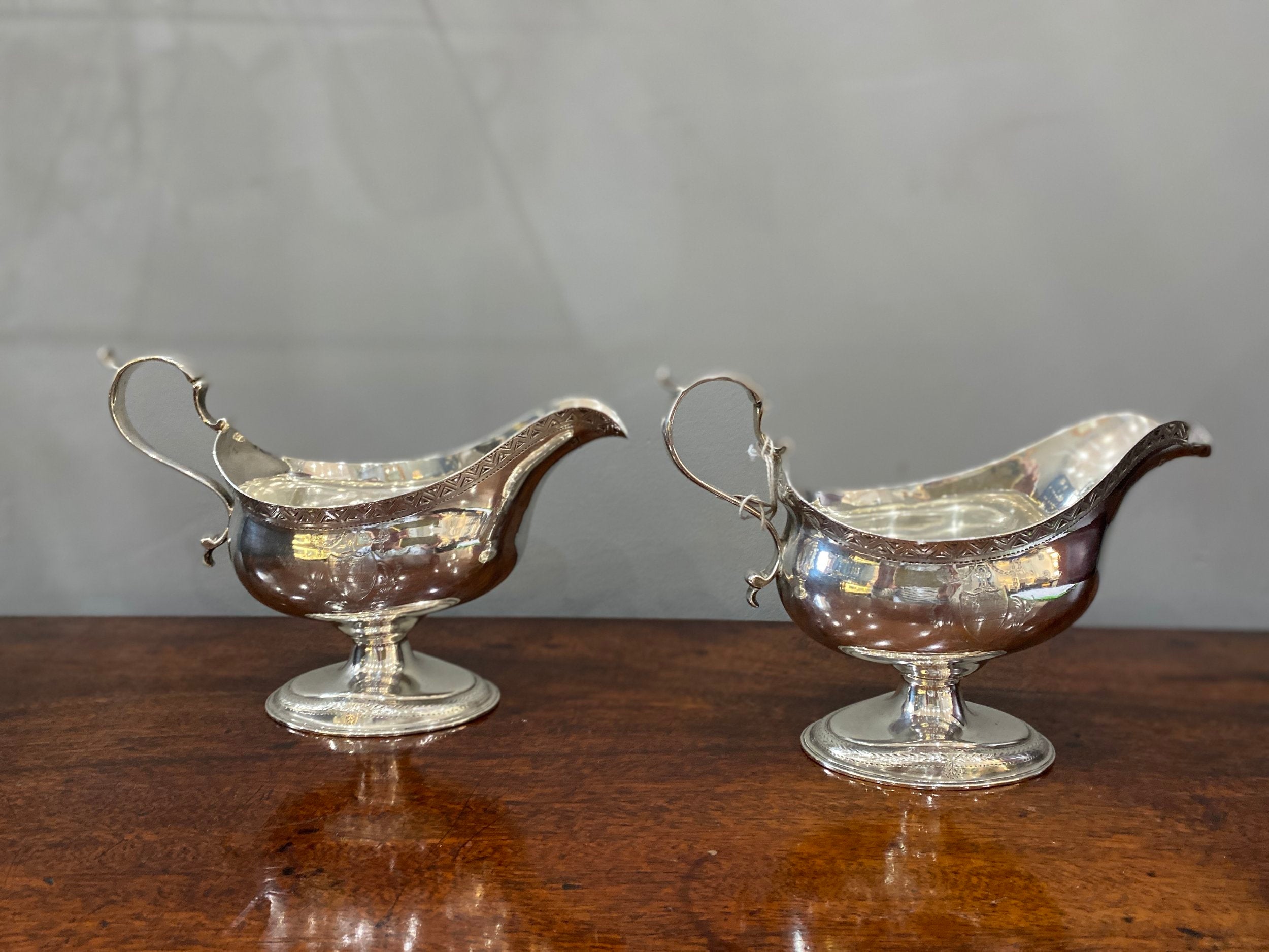 A pair of George III silver sauce boats on pedestal base by William Skeen, London circa 1780 (BN5634)