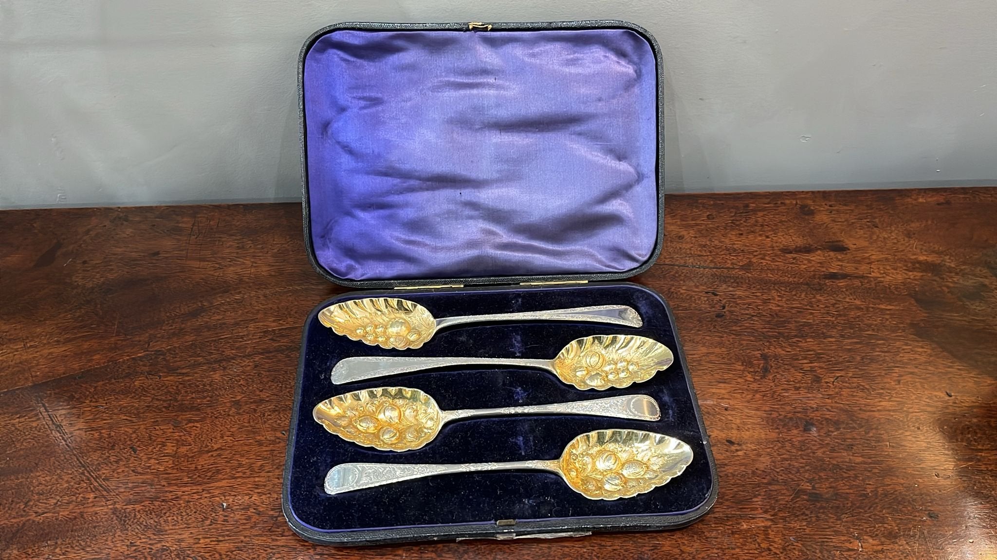 Boxed set of four silver gilt berry spoons by John West and William Eaton. London 1814 & 1835 (BN863)